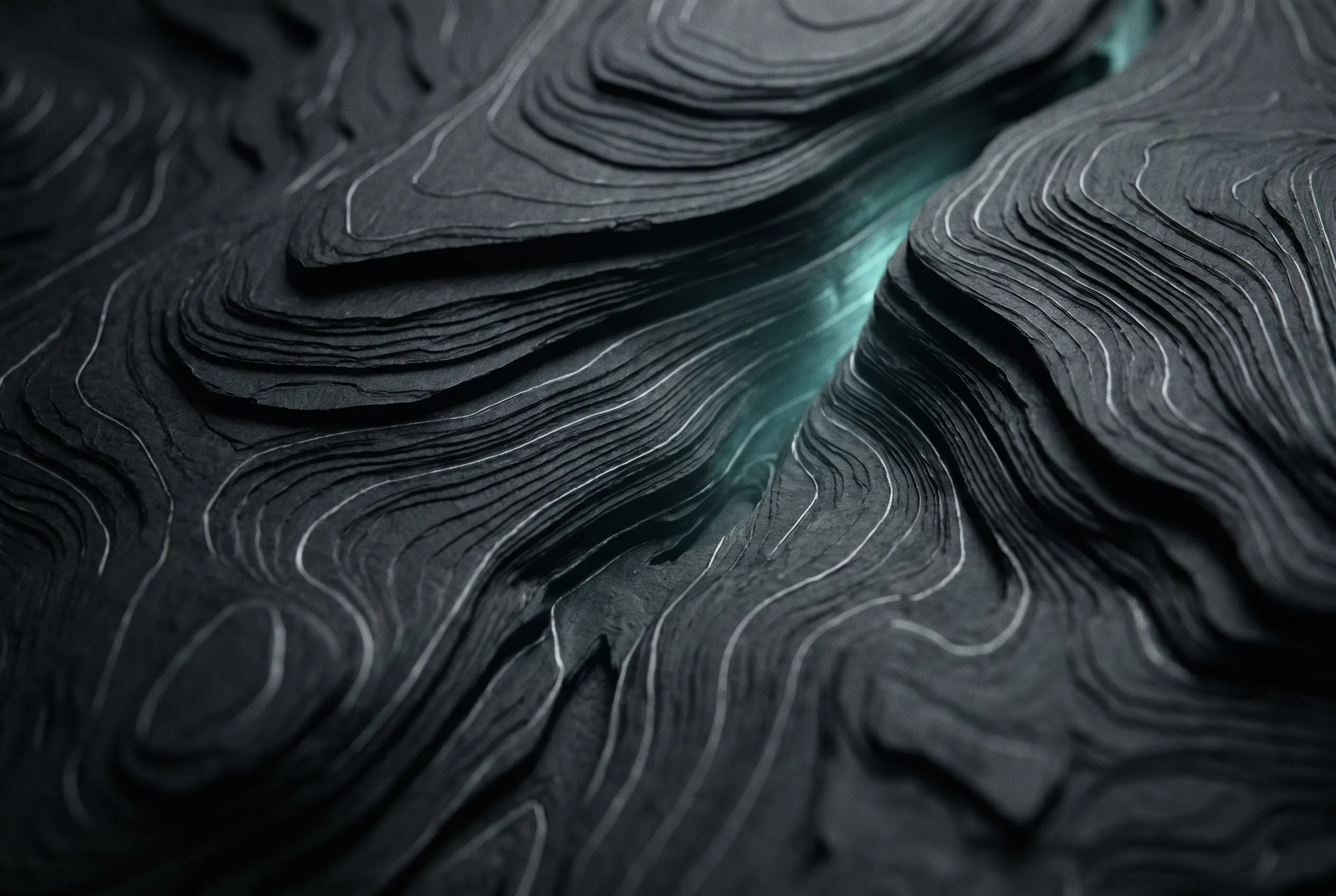 Charcoal topographic layers with a faint teal glow
