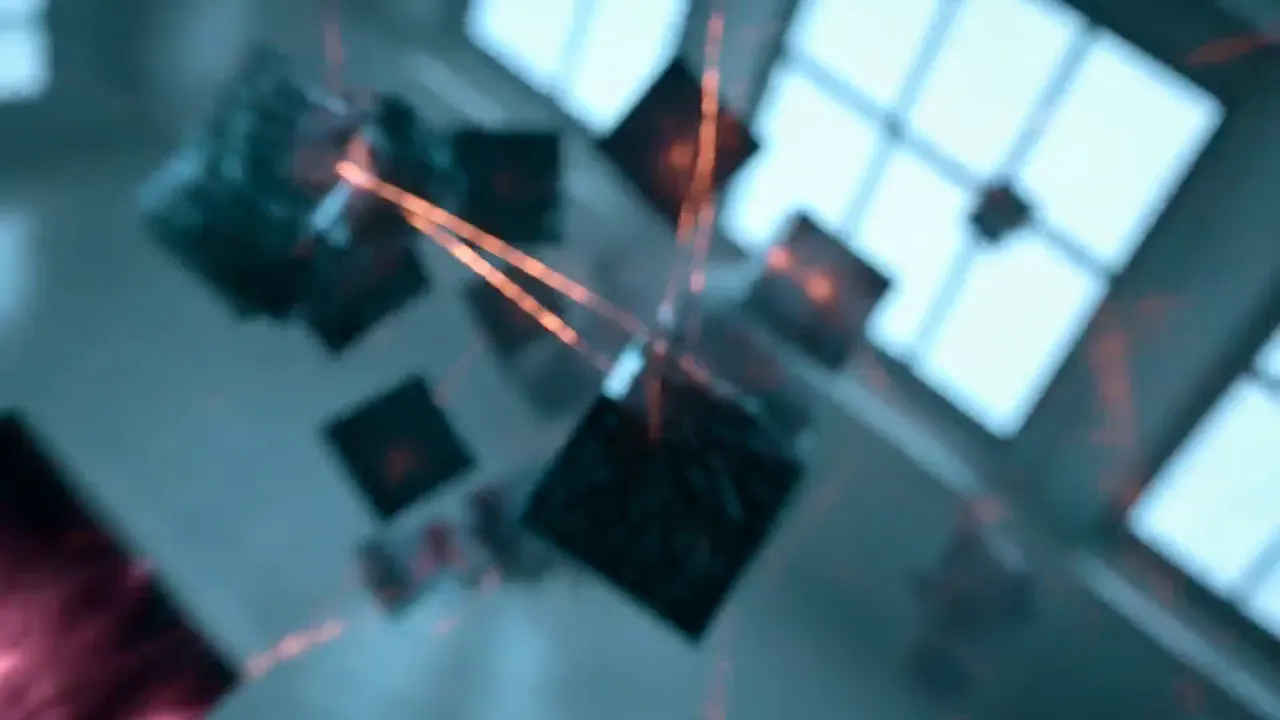 Crimson and amber shards breaking apart across a dark field